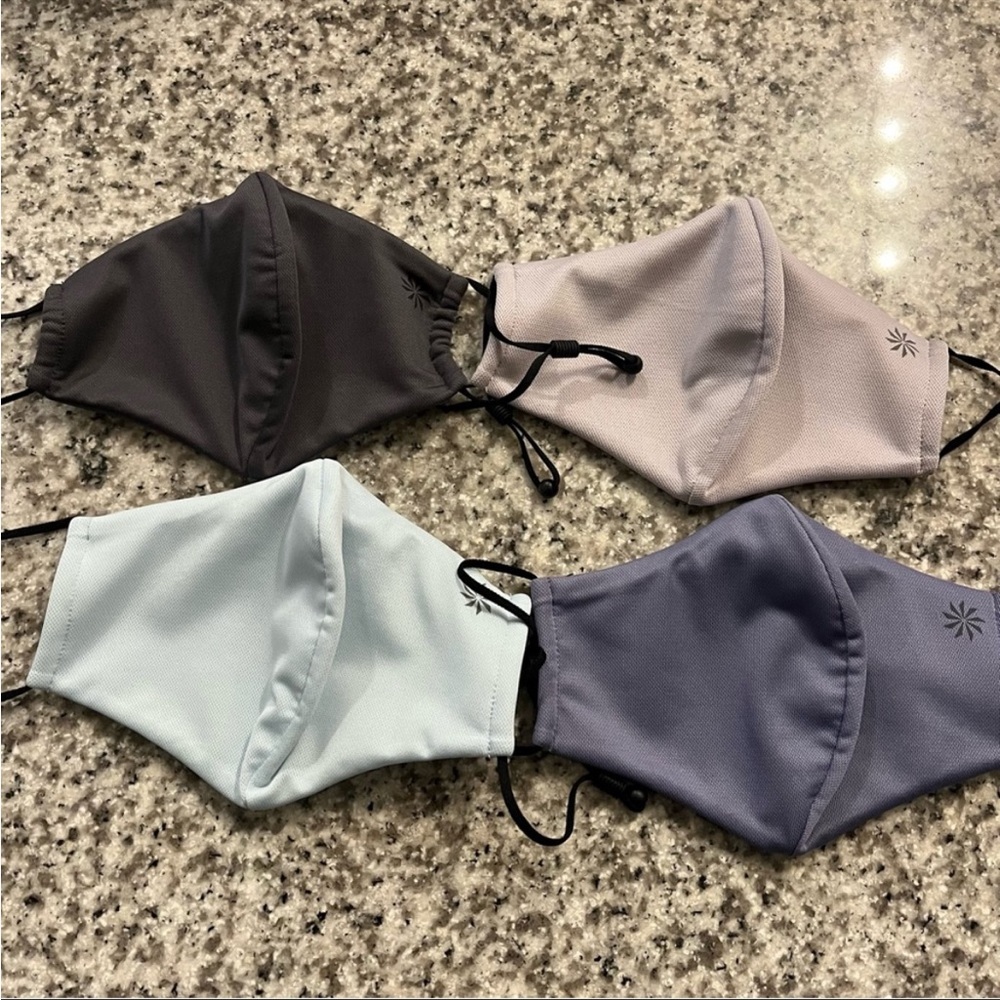 Athleta face masks in grey, blue, purple, and pink